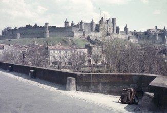 View of hilltop castle medieval citadel Carcassonne, France c 1960 fortified city department of