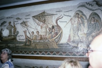 National Museum Bardo, Tunis, Tunisia 1998 Tour group looking at Roman mosaics, Odysseus in a ship