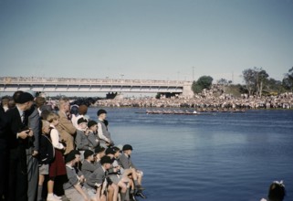 Crowds of spectators at the Henley Regatta, Yarra River, Melbourne, Victoria, Australia 1956