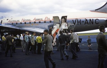 Australian National Airways VH ANC Douglas DC4 aircraft passengers boarding, Royal Mail emblem,