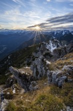 Mountain panorama, mountain landscape with sun star at sunset, at the summit of the Kramerspitz, in