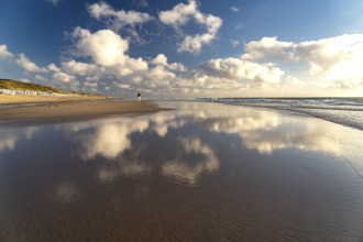 Clouds reflected in the water on the west beach near Westerland, island of Sylt, district of North