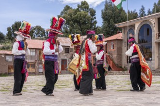 Traditional indigenous musical performance, Huillanopampa, Titicaca lake, Puno, Peru, South America