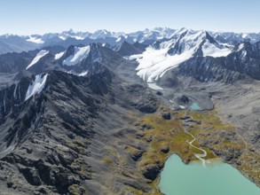 Mountain panorama, aerial view, 4000 metre peak with glacier, mountain pass and mountain lake