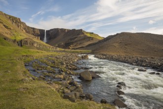 Hengifoss waterfall is located in Hengifossá in Fljótsdalshreppur, East Iceland. With 128 meters it