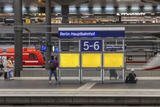 Berlin Central Station, platform hall with platform, station sign and ICE. Berlin, Germany, Europe