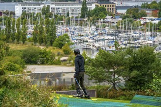 CopenHill, waste incineration plant and artificial ski slope, skiing with a view of Margretheholms