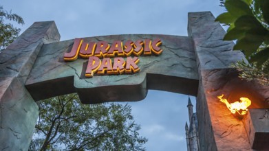 Sign on arch at entrance to Jurassic Park area of Islands of Adventure at Universal Studios in