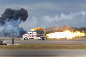 Kent Shockley performs his jet truck ground show during air show at NAS Jacksonville, Florida, USA,