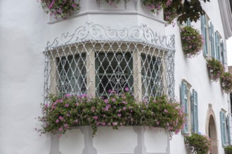 Traditional house with bay window, floral decoration, Eppan, South Tyrol, Italy, Europe