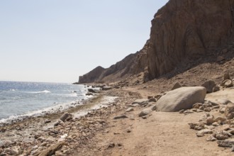 The coastline of the Red Sea and the mountains in the background. Egypt, the Sinai Peninsula, Dahab