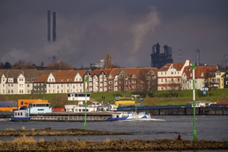 The river Rhine near Duisburg, houses on the Rhine dyke, Laar district, Thyssenkrupp Steel