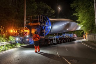 Transport of a 68 metre long, 22 tonne blade of a wind turbine, here in Schwelm, with a