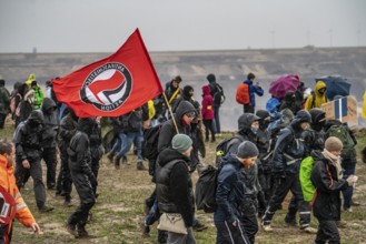 Many thousands of demonstrators march after a demonstration against the demolition of the lignite