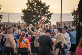 Dense crowd at an open-air concert during sunset, Malleparty Böblingen, Germany, Europe