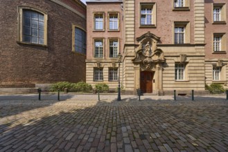 Entrance to a historic building and St Joseph's Chapel on Altestadt street in the old town of