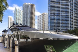 Luxury yachts in Miami marina near financial and business center and Biscayne bay