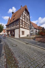 Historic town hall with cobbled street in Michelstadt, Odenwald, Odenwaldkreis, Hesse, Germany,