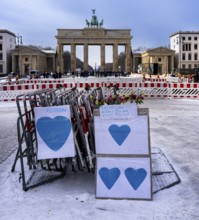 Demonstration, posters and barriers at the Brandenburg Gate, Berlin, Germany, Europe