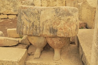 Tarxien neolithic megalithic prehistoric temple complex site, Malta, statue of skirt and legs of