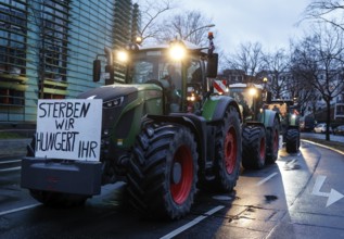 Thousands of farmers demonstrate with their tractors against the planned cancellation of the