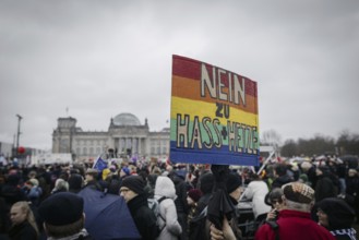 Posters at the large demonstration against the right in Berlin under the slogan We are the firewall