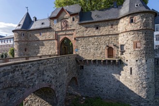 Castle gate, south gate of the medieval Friedberg castle, bridge over castle moat, Hirschgraben,