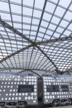 Local train and glass roof at Cologne Central Station, Cologne, Rhineland, North Rhine-Westphalia,