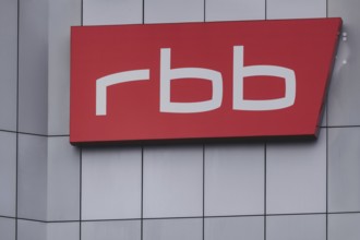 The sign of Rundfunk Berlin-Brandenburg (RBB) hangs on their broadcasting centre in Berlin,