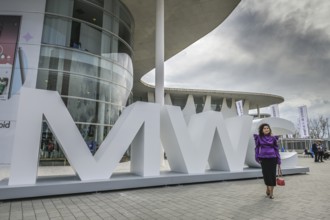 Visitor outside the exhibition centre, MWC Mobile World Congress 2024, Barcelona, Spain, Europe