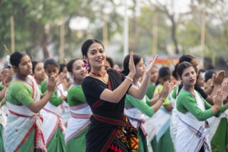 An instructor dance Bihu as she teach bihu dance at a workshop, ahead of Rongali Bihu festival, in