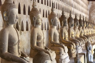 Ancient Buddha statues in the courtyard of Wat Si Saket, Vientiane, Vientiane province, Laos, Asia