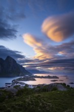 Cloudy landscape. The villages of Olenilsoy, Toppoya (Toppoy) and Hamnoy as well as the mountain