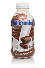 Müllermilch chocolate flavour in the bottle of the company Theo Müller cut out in front of a white