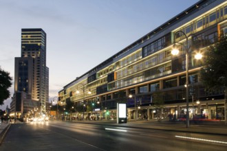 Evening atmosphere in Berlin's City West with the Bikini Sopping mall, right, and the Waldorf