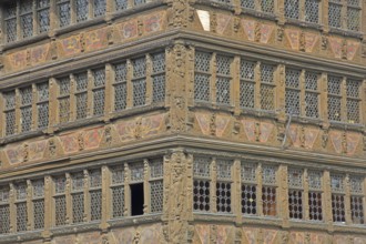 Facade of Maison Kammerzell built in 1427, historic half-timbered house with decorations, wood