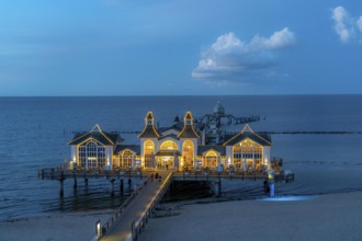 The pier of Sellin, evening mood, sunset, 394 metres long, with restaurant, jetty, island of Rügen,