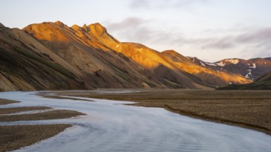 Rhyolite mountains and river Jökulgilskvísl, Landscape at Landmannalaugar, Dramatic volcanic