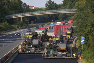 Essen, North Rhine-Westphalia, Germany, Road construction, Asphalt pavers and road rollers lay new,