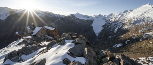 Mountain panorama and glacier, mountain hut Ramolhaus in autumn with snow, view of Gurgler Ferner