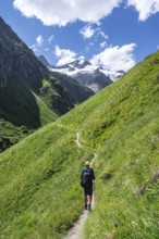 Mountaineer on a hiking trail in Umbaltal, Venediger Group, Hohe Tauern National Park, East Tyrol,