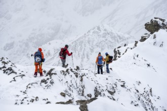 Kit tourers on the summit of the Köllkuppe or Cima Marmota, snow-covered mountain landscape, Ortler