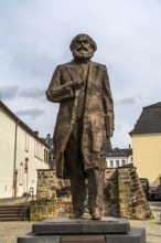 The Karl Marx statue on Simeonstiftplatz in Trier, Rhineland-Palatinate, Germany, Europe