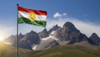 The flag of Kurdistan flutters in the wind