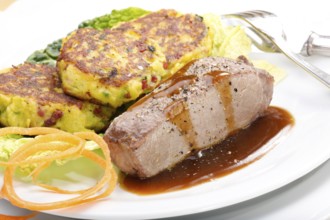 Swabian cuisine, medallions of wild boar with savoy cabbage cakes, meat dish, roasted, hearty, home