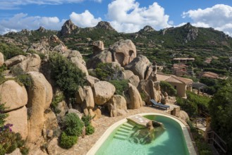 Red rocks and holiday homes, Costa Paradiso, Sardinia, Italy, Europe