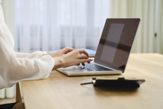 Closeup view of female hands typing application for dismissal