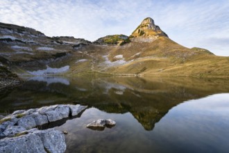 Lake Augstsee and the Atterkogel mountain on the Loser. Autumn, good weather, blue sky, little