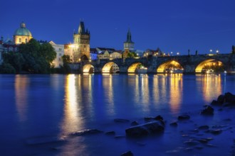 Charles Bridge (Karluv Most) on the Vltava River and Old Town Bridge Tower, at night, Prague, Czech