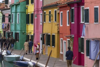 Colourful houses on the canal in Burano, Veneto, Italy, Europe